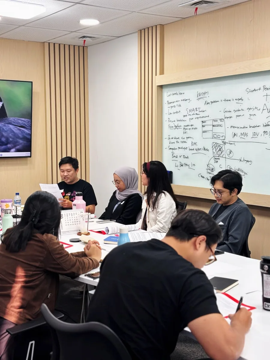 FIRST Indonesia employees discussing workplace communication during training